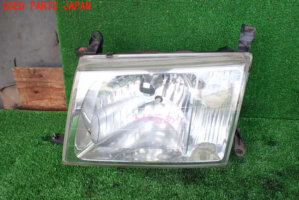 1UPJ-97451132]ランクル100系(UZJ100W)左ヘッドライト ハロゲン 中古_m0001.jpg