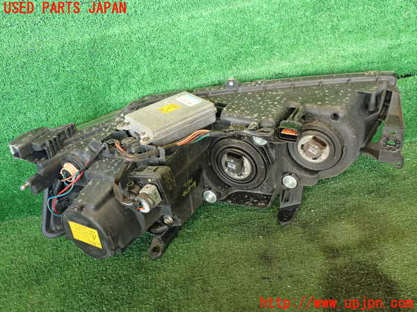 2UPJ-14221130]ランエボ7 GT-A(CT9A)右ヘッドライト HID 中古 の