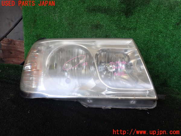 1UPJ-19581130]ランクル100系(UZJ100W)右ヘッドライト ハロゲン 【ジャンク】_m0001.jpg
