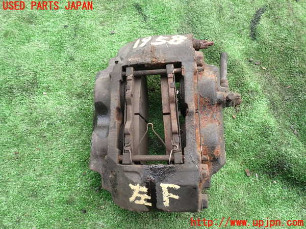5UPJ-19584085]ランクル100系(UZJ100W)左フロントキャリパー 中古_m0001.jpg