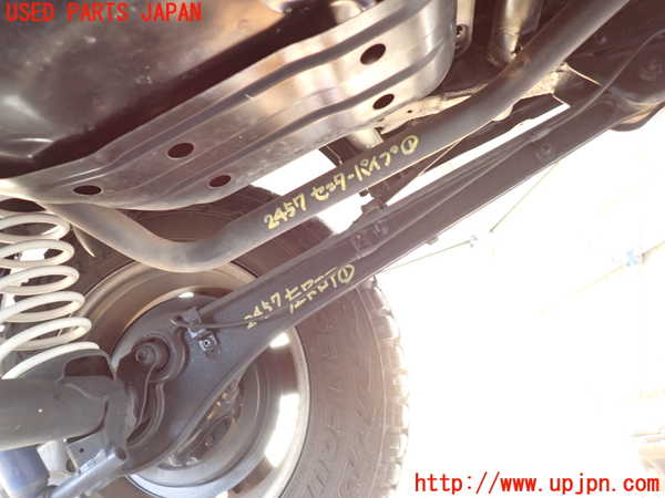 5UPJ-24575226]ジムニー(JB23W)左リアロアアーム1 中古_m0001.jpg
