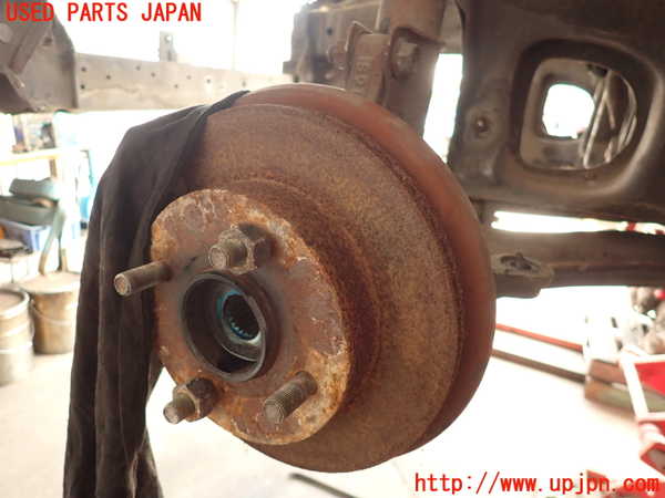 2UPJ-26634295]フィガロ(FK10)左フロントナックルハブ 中古_m0001.jpg