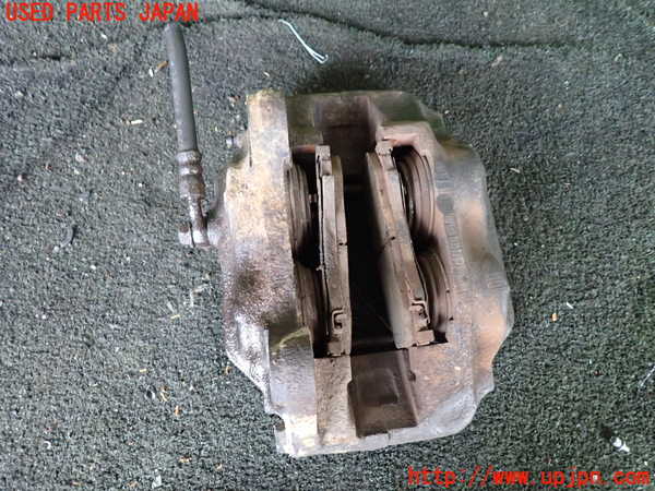 1UPJ-29034085]ランクル100系(UZJ100W)左フロントキャリパー 中古_m0002.jpg