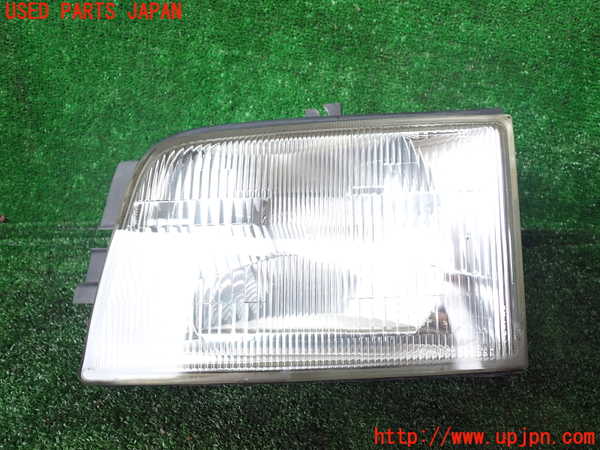 1UPJ-33231132]ビッグホーン(UBS26GW)左ヘッドライト ハロゲン 中古_m0001.jpg