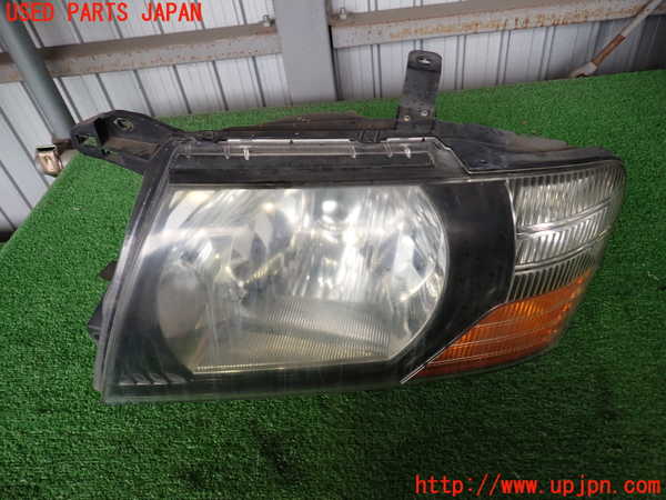 2UPJ-33261132]パジェロ(V75W)左ヘッドライト HID 中古_m0001.jpg
