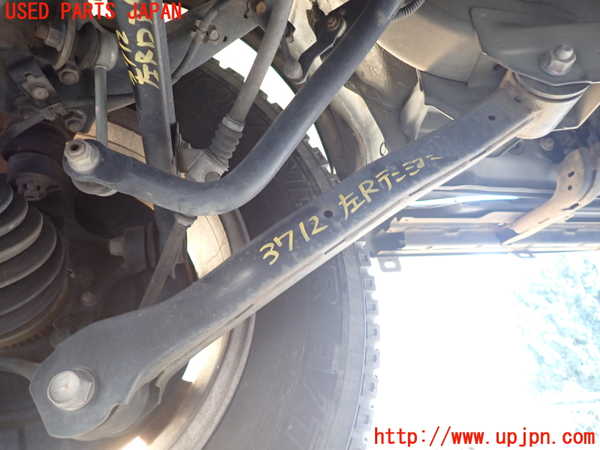 1UPJ-37125330]パジェロ(V98W)左リアテンションロッド 中古_m0001.jpg