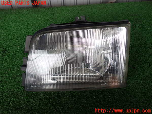2UPJ-41131132]ビッグホーン(UBS73GW)左ヘッドライト ハロゲン 中古_m0001.jpg