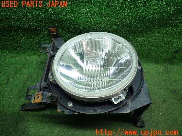3UPJ=10650050]ランクル80系(FZJ80G)後期 左ヘッドライト ランプ ガラス レンズ 中古_m1