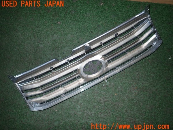 3UPJ=28010047]ランクル100(UZJ100W)前期 UNCLE 725B2 FJ100 フロントグリル 中古_m1