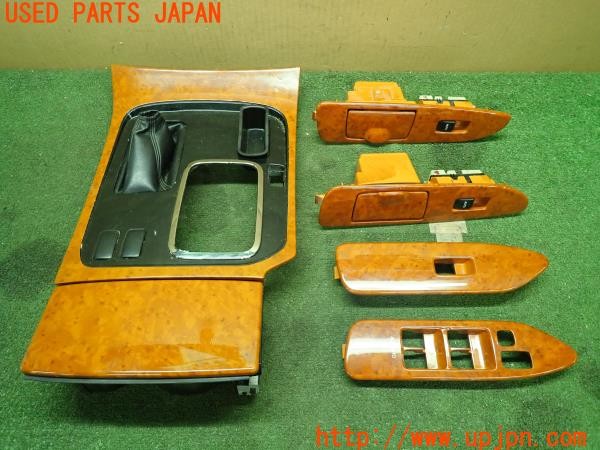 3UPJ=29030645]ランドクルーザー100(UZJ100W)中期 純正 木目調パネル ドアスイッチ シフトパネル 中古_m0