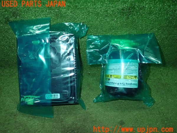 3UPJ=37650625]カローラ ツーリング ハイブリッド(ZWE219W)純正 パンク修理キット 中古_m3